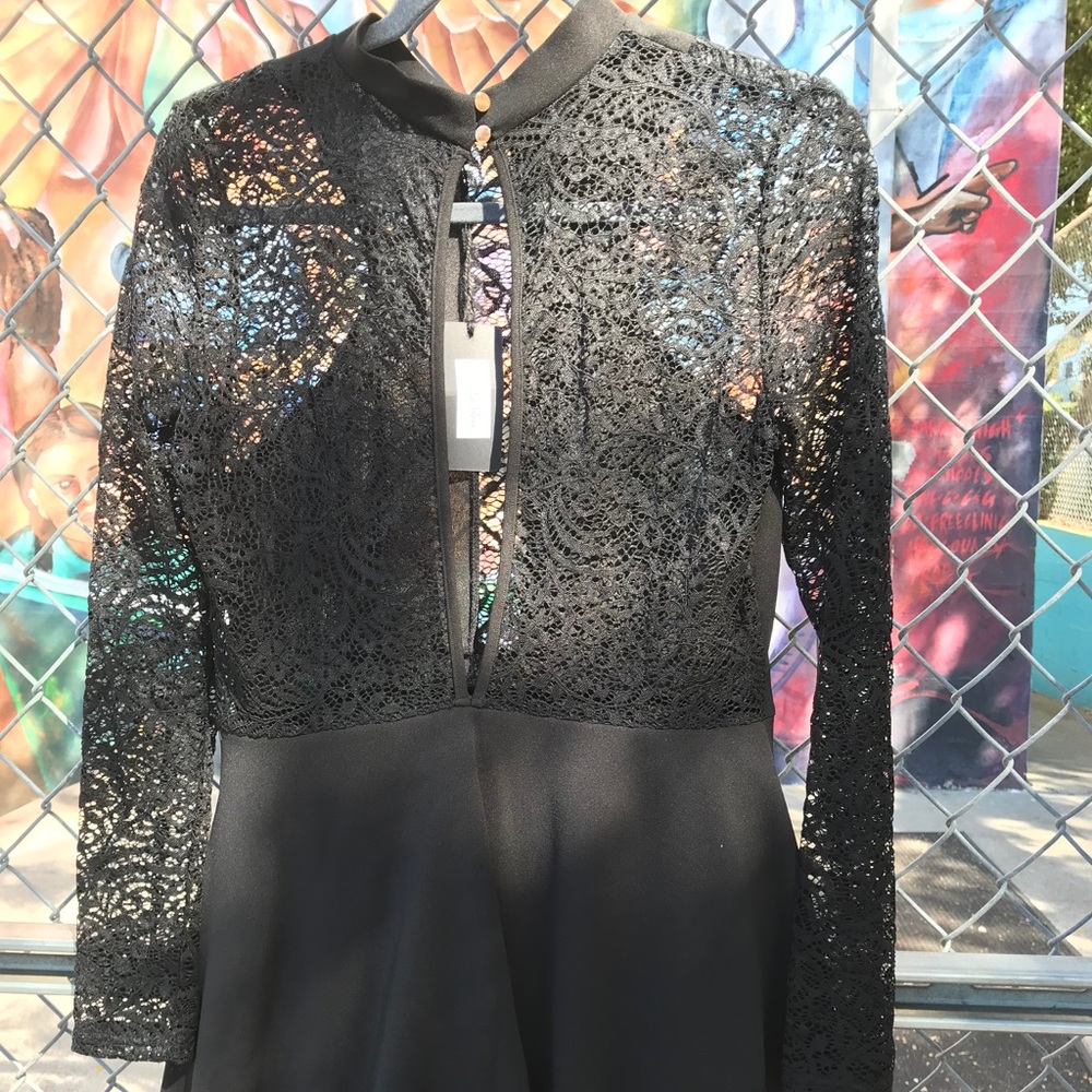 Woven romper with lace details